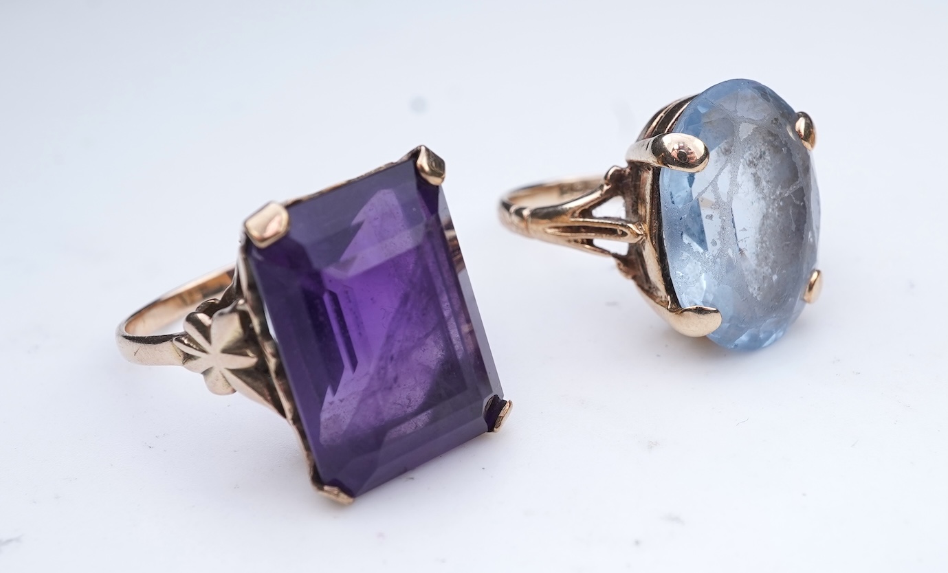 Four gem-set rings